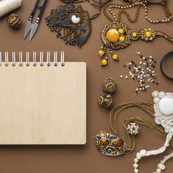 top-view-essentials-bead-working-with-notebook